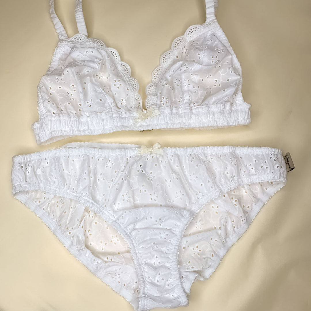 flatlay of broderie anglaise lingerie set