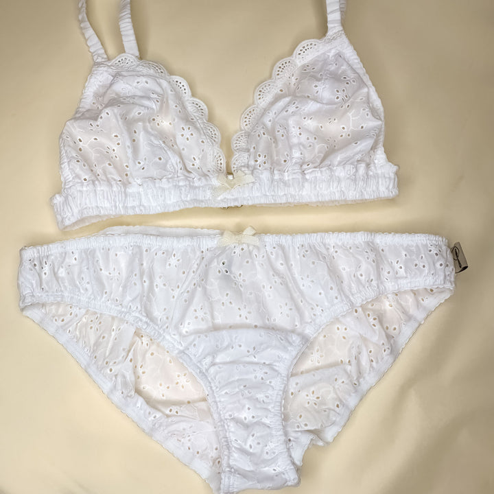 flatlay of broderie anglaise lingerie set