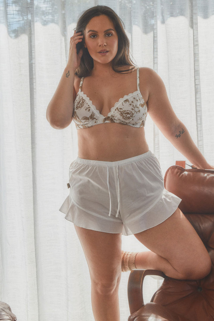curvaceous model wearing organic cotton lingerie in floral print