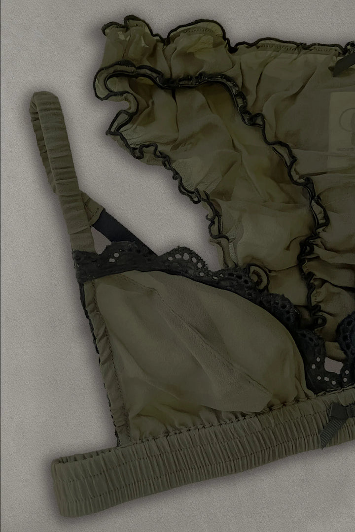 flat lay of silk olive green lingerie set