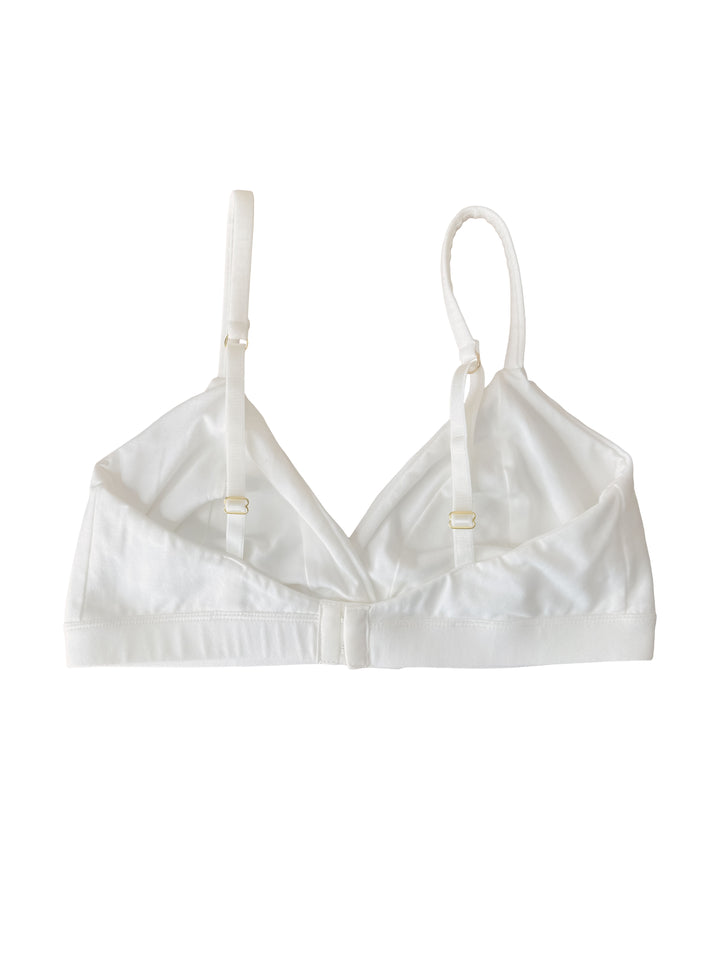 White organic cotton bra on a white background, back view