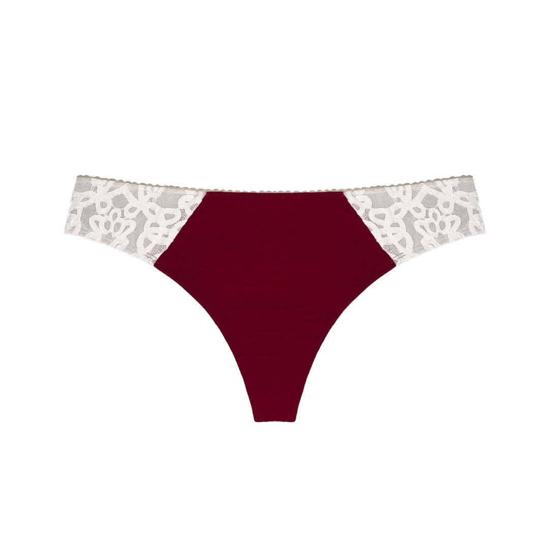 flat lay of red and lace thong