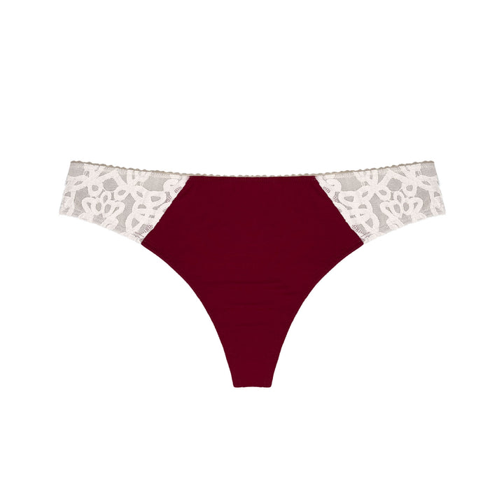 flat lay of red and lace thong