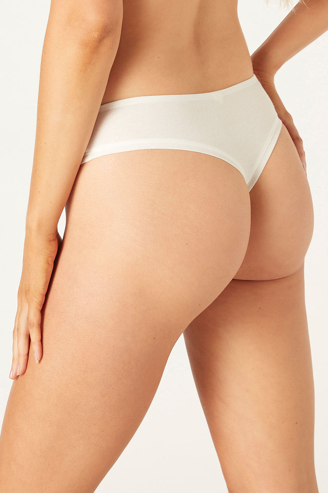 model showing back or organic cotton thong, eco intimates, organic basics, everyday underwear