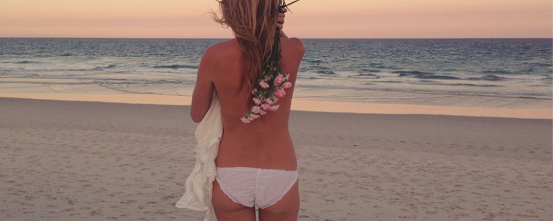 sunset on beach in underwear, eco intimates