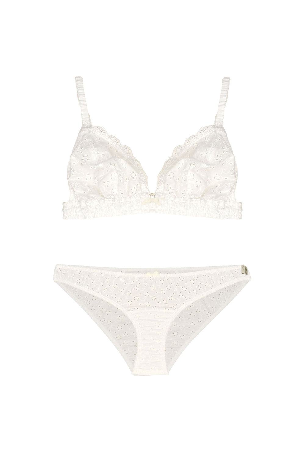 White cotton broderie lace lingerie set on a white background