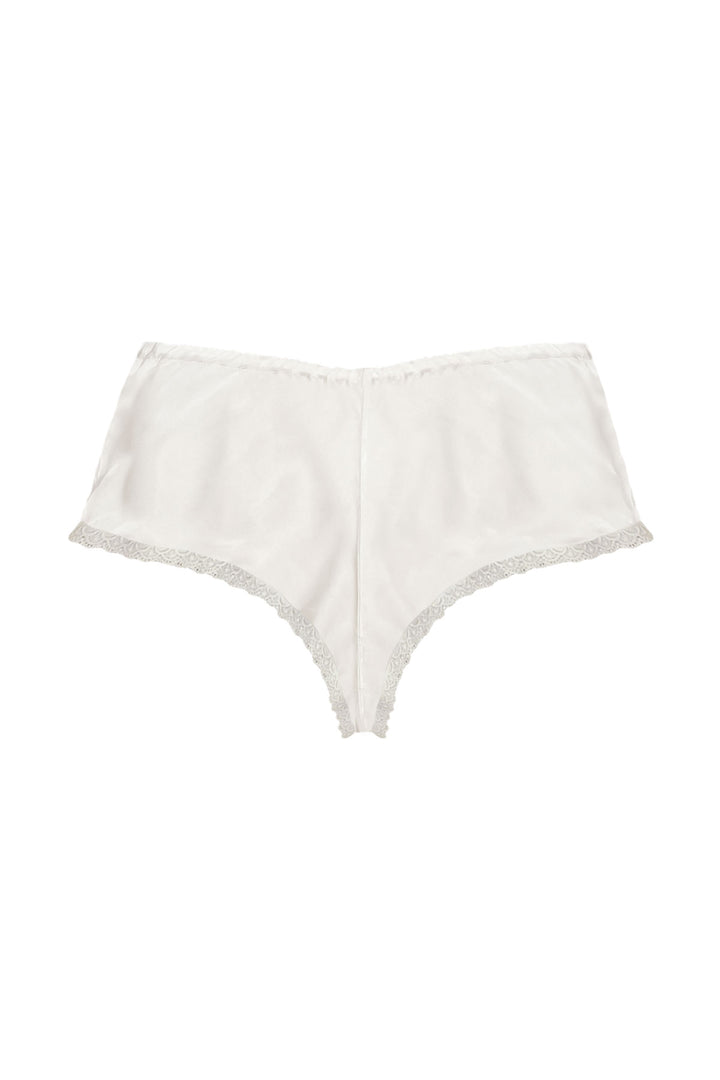 White bamboo shorts trimmed with lace on a white background