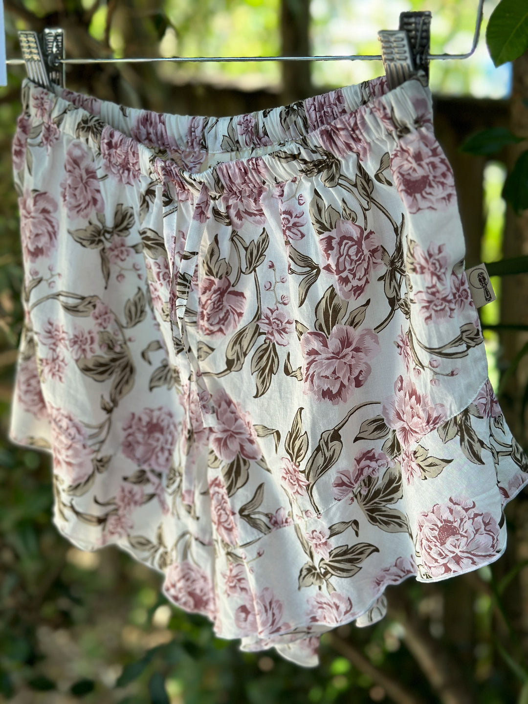 floral organic cotton shorts with frill along hem line