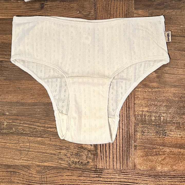 panties set on a wooden surface