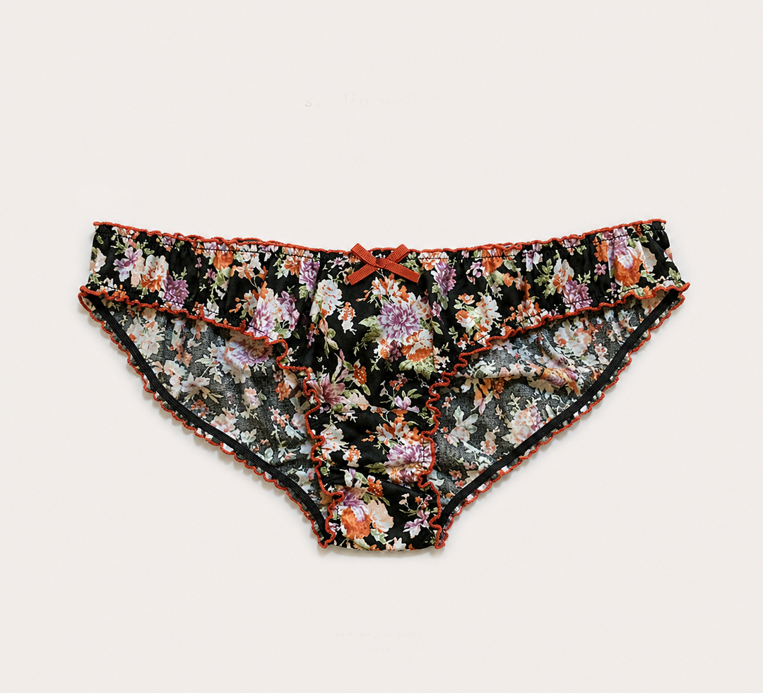 Floral-patterned underwear on a light gray background