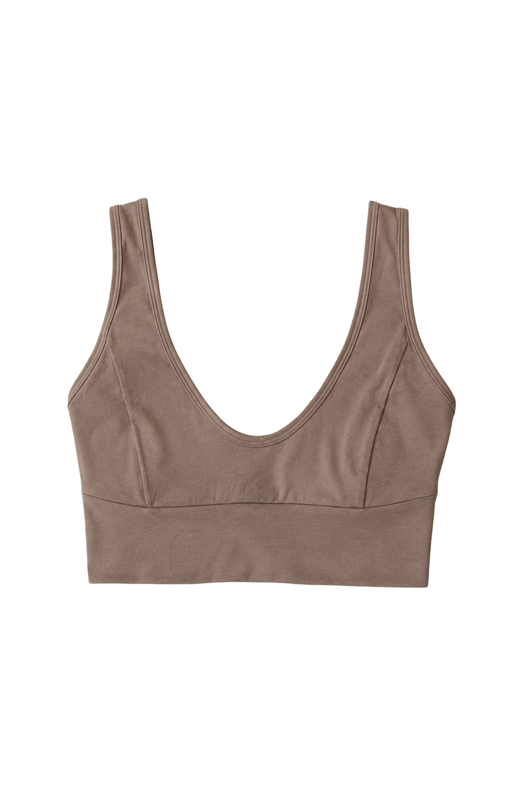 A SOFT BROWN, crop bra made from organic cotton, with a v-neckline and wide straps.