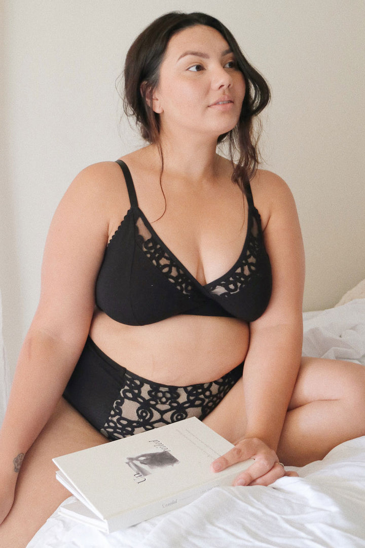 model wearing soft cup bra in black
